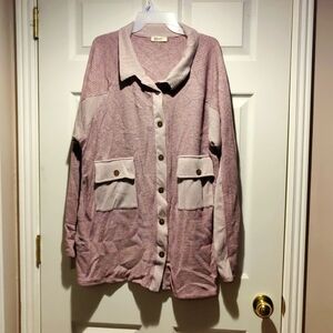 Mauve jacket with lighter pink accent on pockets and sleeve by Blumin